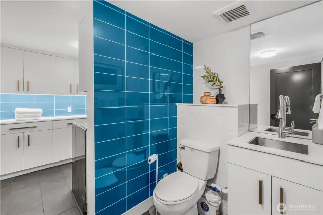 Laundry and half bath.  Is plumbed to add a shower if desired.