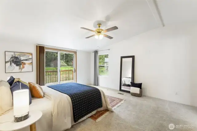 Primary bedroom with access to front deck.