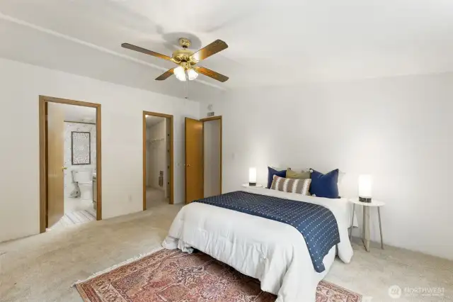 Primary bedroom with ensuite and walk-in closet.