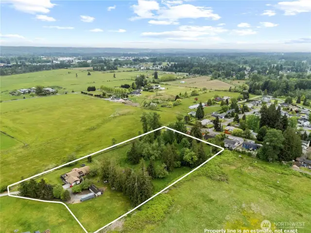 This one-owner rambler sits on nearly 5 level acres with breathtaking mountain view.