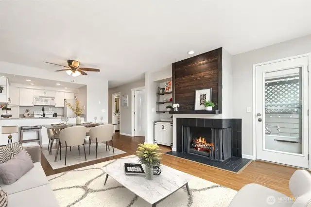 Virtually Staged! Door to outside deck from living room area.