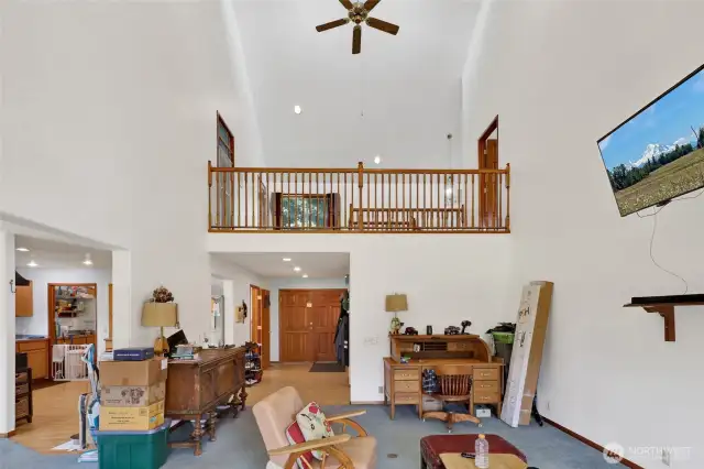 Soaring vaulted ceiling at main floor living room.