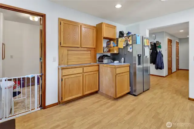Main floor kitchen and walk in pantry.