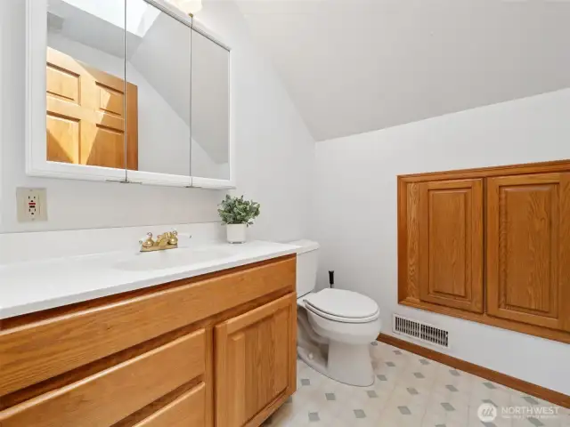 Upstairs half bath.