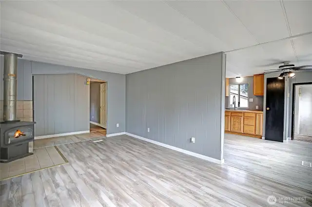 Spacious living room with new flooring throughhout.