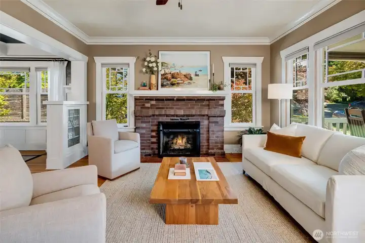 Classic brick fireplace, original leaded-glass built-ins, and a ton of old-world charm coupled with modern conveniences.
