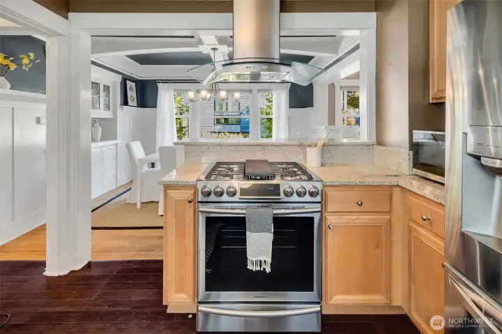The kitchen opens to the dining room.