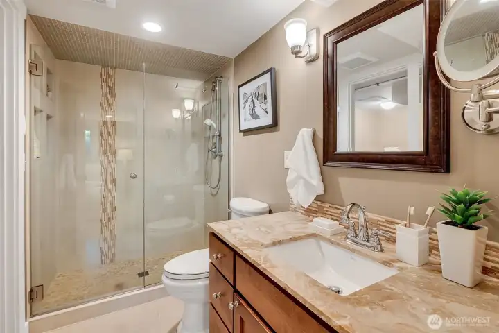Primary ensuite ¾ tiled bath.