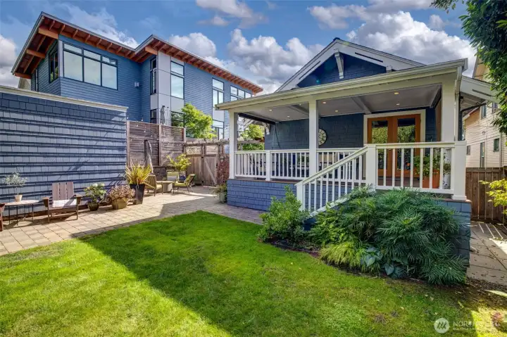 Pristine back yard with paver patio, and a covered back porch. Life is good!