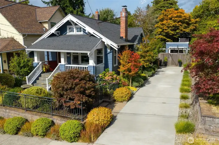 Hello, Fall colors!  Meticulously maintained 1926 Craftsman Tangletown Bungalow. Professionally landscaped with an irrigation/sprinkler system and a long driveway to park 4 cars tandem.