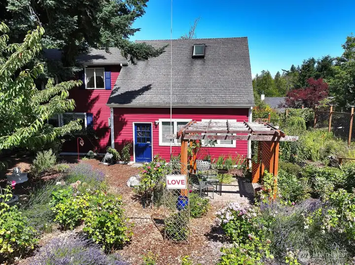 Blue door is to the garage/workshop space.