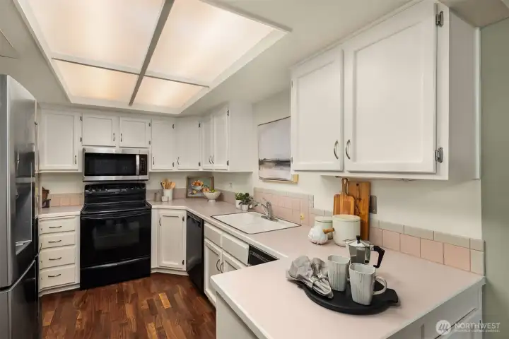 Kitchen with walk-in pantry.