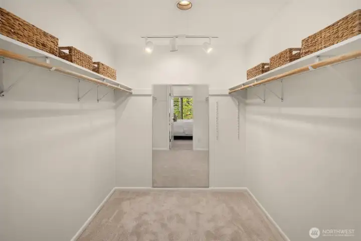 Primary bedroom walk-in closet