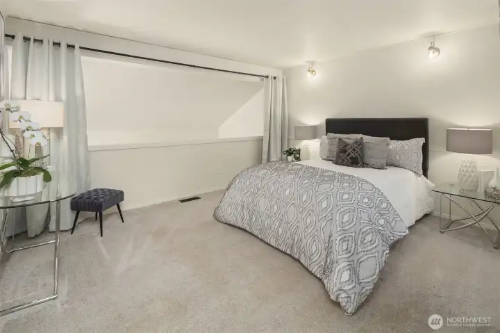 Upstairs, the generous loft-style primary suite provides a peaceful retreat with space to relax, recharge, or create your own cozy corner.