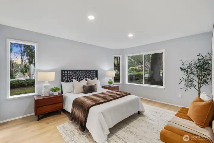 The primary bedroom tucked in the back of the unit creates privacy and peace for retreating each day