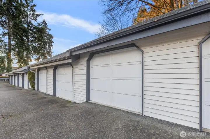 Two parking spaces are included, one in individual garage and one in the common parking spaces