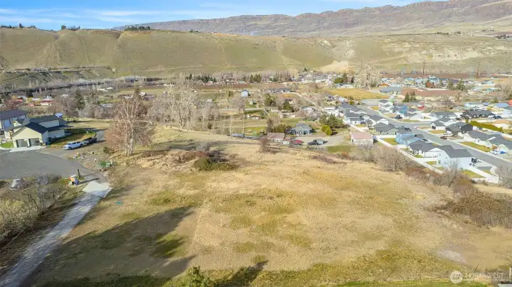 Build-ready level building pad with most utilities installed, located at the end of a private driveway for maximum privacy. Power is on site and the property is served by a private shared well—making this an exceptional opportunity for a custom home estate, or multi-generational living.