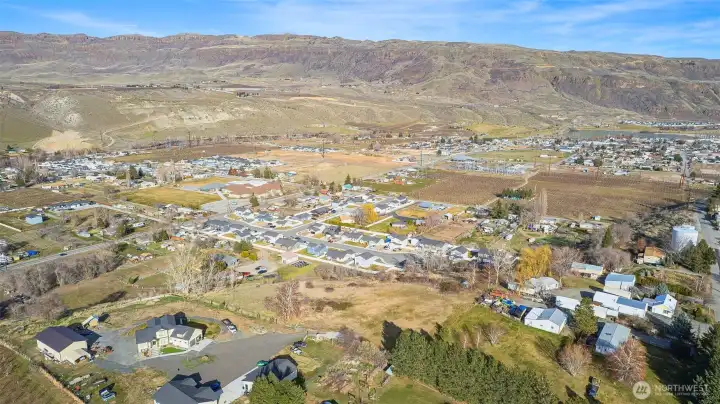 Topography includes a gradual slope at the rear of the property, maximizing view potential and offering increased privacy with no immediate neighbors behind. Ideal for positioning a custom home to capture both scenery and seclusion.