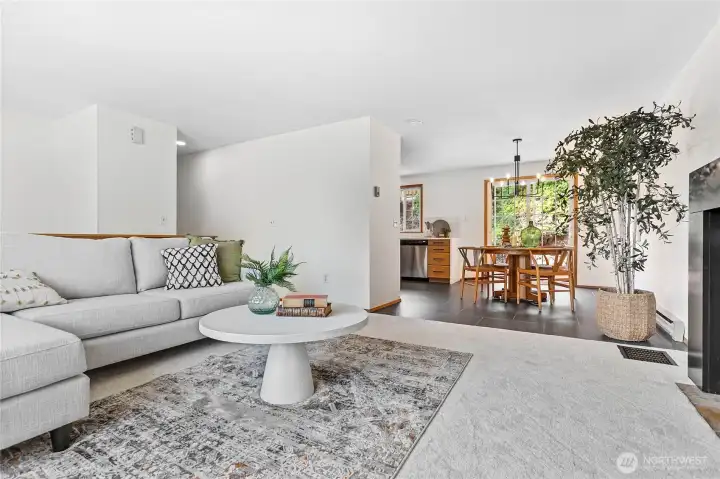 Living opens to dining, kitchen & back deck. Fresh paint throughout.