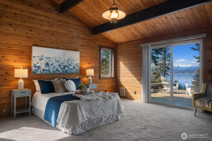 With its own sliding glass door, the primary bedroom keeps the beauty of the setting close at hand... making it easy to imagine quiet mornings that begin with coffee, fresh air, and moments to simply take it all in.