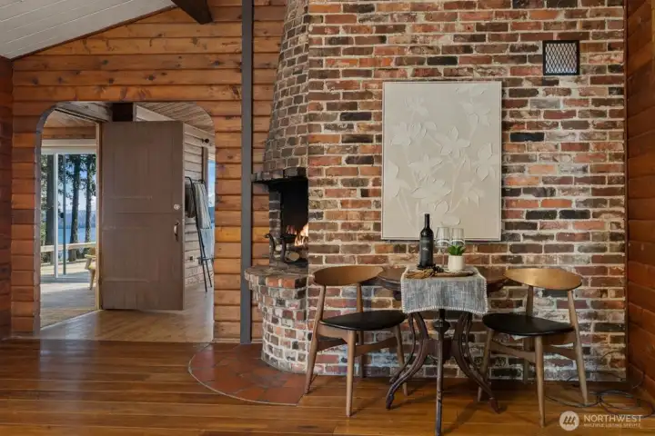 On the other side of the propane living room fireplace, this wood-burning fireplace brings such a cozy, welcoming feel to the kitchen... the kind of feature that makes slow mornings, simmering dinners, and lingering conversations feel even more special.