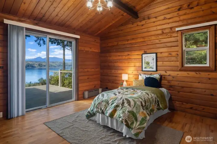 Even the second bedroom has a sliding glass door... such a lovely touch that gives guests their own access to the light, the views, and the beauty of the setting.