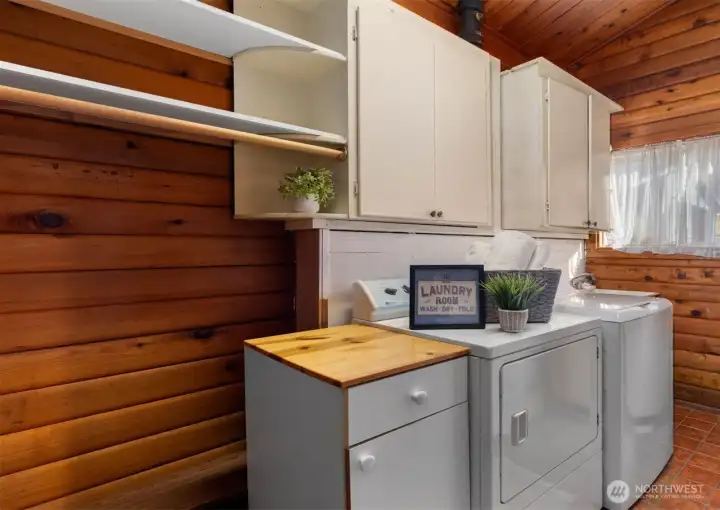 A spacious laundry room like this is always a welcome surprise... functional, comfortable, and ready to make the practical parts of life feel a little easier.