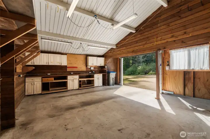 There’s a fabulous workshop area inside the garage, giving you a dedicated space for projects, hobbies, or the kind of practical work that’s easier when everything has its place.