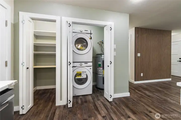 A walk in pantry and a full size, brand-new stackable washer and dryer!