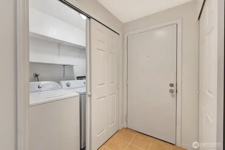 Utility room with full size washer and dryer