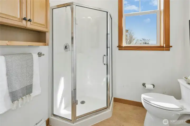 Main floor 3/4 bathroom adjacent to bedroom.