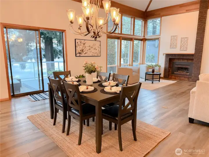 Warm wood accents and gorgeous lighting make the large living room inviting and cozy