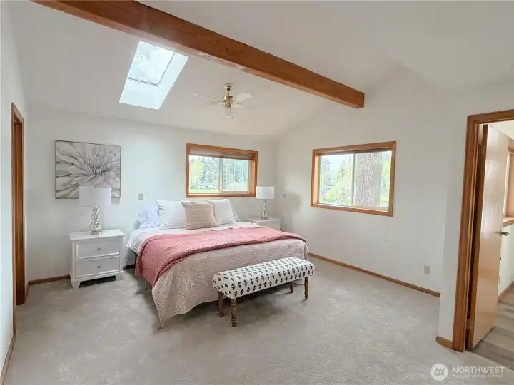 Primary bedroom on the main level with its own private bathroom for effortless single-level living