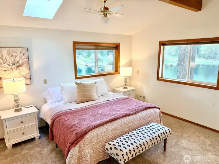 Enjoy a view of the lake from the primary bedroom, too