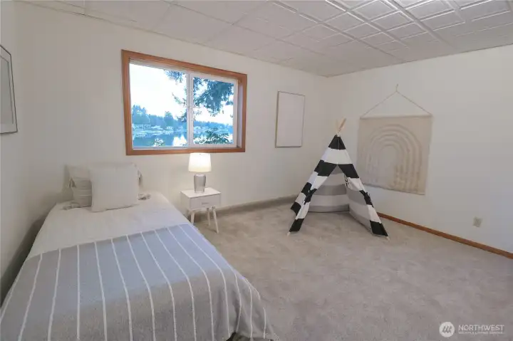 This downstairs room could be an office, playroom, or whatever you need