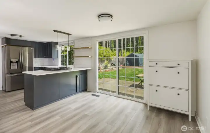 Looking through the eating space into the kitchen