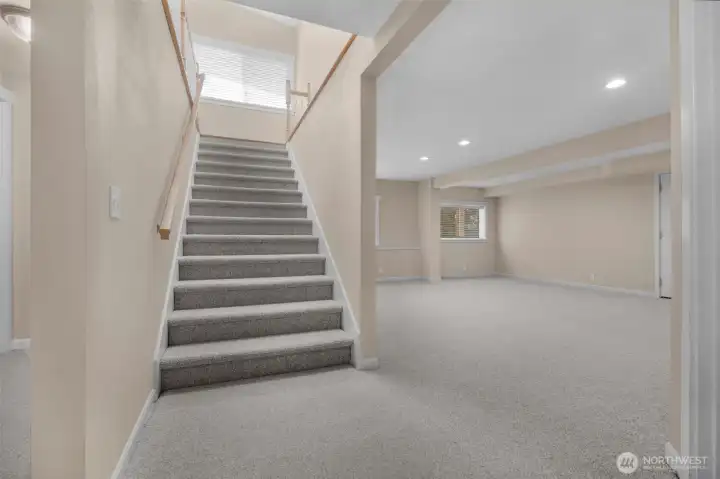 Wide Staircase Leading to Second Living Room