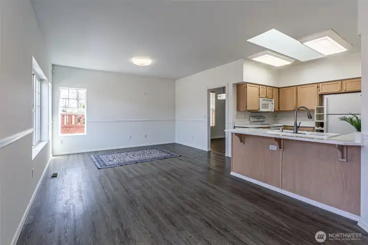 Another view of eating space opened up the the family room space.