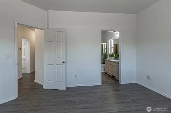 Master bedroom with private bathroom & walk in closet.