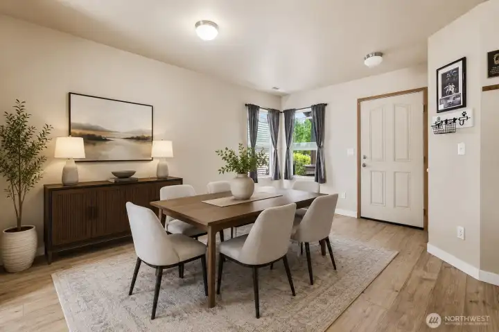 This is a virtually staged picture of the same space - it has room for large dining table (This is AI to show what dining could look like) This is a virtually staged picture of the same space - it has room for large dining table (This is AI to show what dining could look like)
