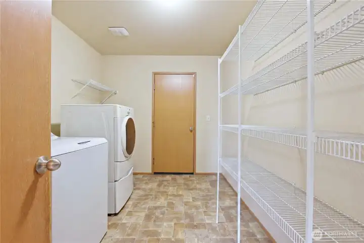 This is the large laundry room and pantry off on the main floor. This is the large laundry room and pantry off on the main floor.