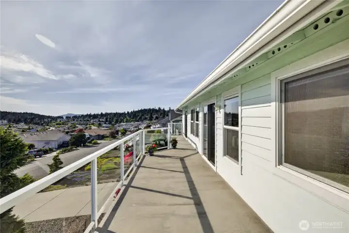 Spacious deck stretching the full length of the home, offering plenty of room to relax, entertain, and take in the surroundings. Spacious deck stretching the full length of the home, offering plenty of room to relax, entertain, and take in the surroundings.