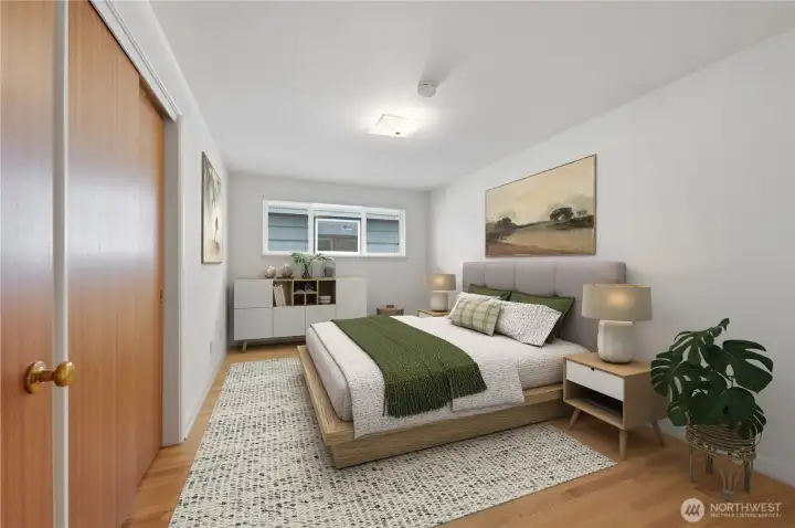 One of two large main floor bedrooms.