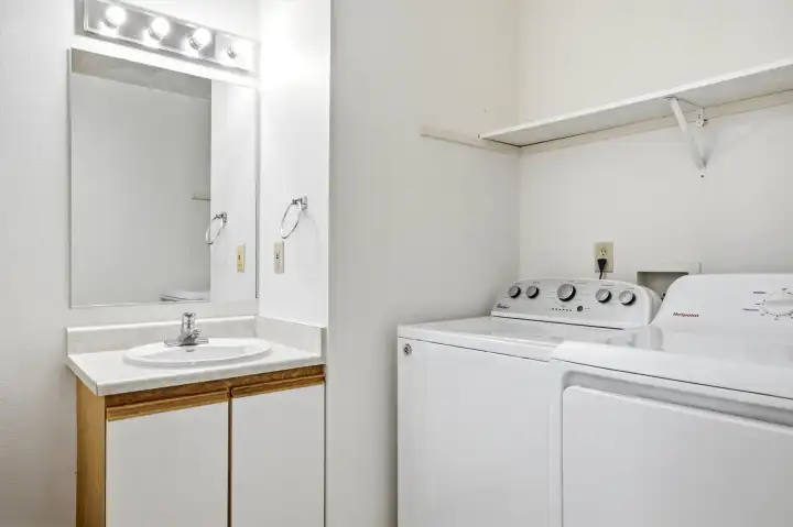 1/2 Bath main floor with laundry. 1/2 Bath main floor with laundry.