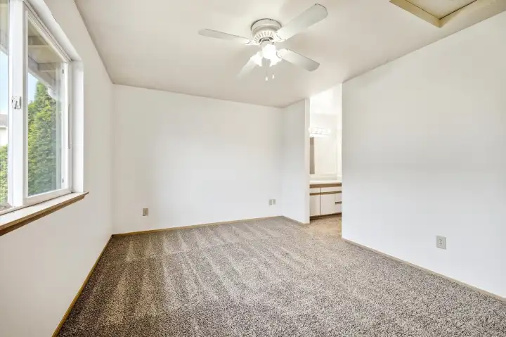 Primary bedroom, main floor. Primary bedroom, main floor.