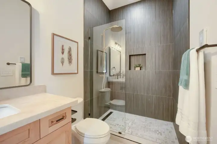 Guest Ensuite Bath W/ heated FL on Main Guest Ensuite Bath W/ heated FL on Main