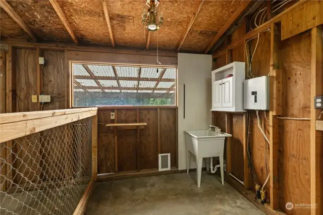 Barn has soaking sink and lots of windows