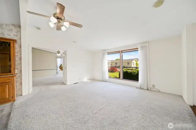 Living room looking towards the entrance and the family room.