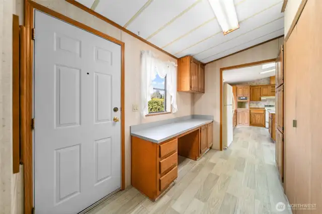 Built-in desk in laundry area. Also lots of additional storage.