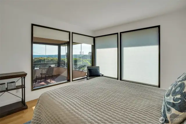 Main floor bedroom offers stunning views and is perfect for guests.